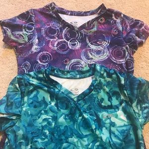 2 Champion athletic T’s. Size 7-8.